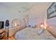 Bright bedroom with laminate floors and ceiling fan with a light fixture at 13024 Prestwick Dr, Riverview, FL 33579
