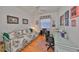 Cozy bedroom with a daybed, desk, ceiling fan, and natural light at 13024 Prestwick Dr, Riverview, FL 33579