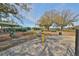 Outdoor dog park with benches, play structures, and greenery providing a clean and inviting space for pets at 13024 Prestwick Dr, Riverview, FL 33579