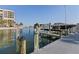 View of boat dock and lift on the canal at 1660 Gulf Blvd # Ph2, Clearwater Beach, FL 33767