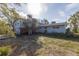 Charming two-story home with a brick accent and a lovely lawn at 2028 Blossom S Way, St Petersburg, FL 33712