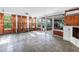 Bright sun room featuring ample windows and access to an outdoor patio area at 2028 Blossom S Way, St Petersburg, FL 33712