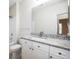 Bathroom features a granite countertop, white cabinets, and a shower-tub combo at 1216 S Missouri Ave # 224, Clearwater, FL 33756