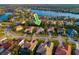 Aerial view of a desirable neighborhood showcasing well-maintained homes and lush landscaping at 10534 Bermuda Isle Dr, Tampa, FL 33647