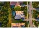 Stunning aerial view showcases the property's private pool, manicured lawn, and desirable neighborhood location at 10534 Bermuda Isle Dr, Tampa, FL 33647
