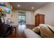 Inviting living room featuring hardwood floors and a sliding glass door leading to an outdoor patio at 10534 Bermuda Isle Dr, Tampa, FL 33647