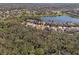 Desirable single-Gathering home in a beautiful neighborhood surrounded by lush trees and serene water views at 13711 Moonstone Canyon Dr, Riverview, FL 33579