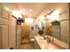 Bathroom with stone shower, neutral walls, and vanity with sink at 1372 Palmetto St, Clearwater, FL 33755