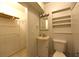 Bathroom view with closet, small vanity and commode at 1372 Palmetto St, Clearwater, FL 33755