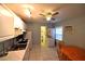 Efficient kitchen design with stainless steel sink, appliances, and eat-in dining space at 1372 Palmetto St, Clearwater, FL 33755
