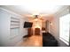 Living Room has neutral paint, tile floors, sofa, and built-in shelves at 1372 Palmetto St, Clearwater, FL 33755