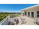 Balcony with outdoor seating and a beautiful view of the surrounding community at 14554 90Th Ave, Seminole, FL 33776