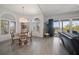 Sun-drenched breakfast nook featuring a cozy round table and seating with outdoor views at 14554 90Th Ave, Seminole, FL 33776