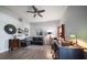 Inviting living room with modern decor, including a comfortable sofa, and contemporary ceiling fan at 14554 90Th Ave, Seminole, FL 33776