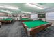 Billiard room with multiple pool tables and comfortable seating at 3010 59Th S St # 303, Gulfport, FL 33707