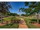 Well-maintained green space with benches and walking paths, perfect for outdoor enjoyment at 3010 59Th S St # 303, Gulfport, FL 33707