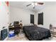 Bedroom with hardwood floors, desk, and windows with blackout curtains at 4142 N Nebraska Ave, Tampa, FL 33603