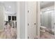 Hallway view towards bathroom and living room at 4142 N Nebraska Ave, Tampa, FL 33603