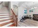View of staircase, archway, and decorated living room at 4142 N Nebraska Ave, Tampa, FL 33603