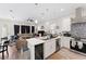 Spacious open-concept living space features a kitchen with a large island and a comfortable living area with natural light at 4142 N Nebraska Ave, Tampa, FL 33603