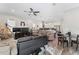 A view of a large open living space that combines the living room, dining area, and kitchen for convenient living at 4142 N Nebraska Ave, Tampa, FL 33603