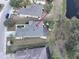 Birds eye view of house with a nearby pond at 920 Regal Manor Way, Sun City Center, FL 33573