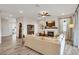 Comfortable living room featuring a fireplace, modern ceiling fan, and neutral-colored decor at 12515 Horseshoe Bend Dr, Lithia, FL 33547