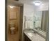 Bathroom features granite countertop vanity and well-lit space at 1655 S Highland Ave # B110, Clearwater, FL 33756