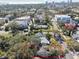 Aerial view highlighting the property within its neighborhood, nearby streets, and the property line outlined in red at 306 S Albany Ave, Tampa, FL 33606