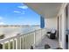 Unwind on this serene balcony with comfortable seating and stunning views of the water at 500 Treasure Island Cswy # 308, Treasure Island, FL 33706