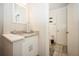 Bathroom featuring a granite countertop, single sink, framed mirror and access to the toilet and shower at 5100 Burchette Rd # 306, Tampa, FL 33647