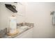 Bathroom featuring a granite countertop, white cabinet, and modern fixtures at 5100 Burchette Rd # 306, Tampa, FL 33647