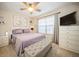 Serene bedroom featuring a comfortable bed, soft lighting, and a spacious layout for relaxation at 5100 Burchette Rd # 306, Tampa, FL 33647