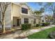 Inviting exterior of home featuring manicured landscaping, neutral colors, and a well-maintained walkway at 5100 Burchette Rd # 306, Tampa, FL 33647