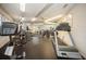Fitness center featuring cardio machines, weight machines, mirrors, and a ceiling fan at 5100 Burchette Rd # 306, Tampa, FL 33647