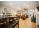 Spacious living room featuring wood floors, a comfortable sofa, and ample natural light at 5100 Burchette Rd # 306, Tampa, FL 33647