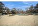 Community pool with brick pavers, lounge chairs and a jacuzzi at 5100 Burchette Rd # 306, Tampa, FL 33647