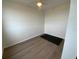 Cozy bedroom featuring wood-look floors and a neutral color palette with minimal decor at 6315 Shoreline Dr # 3204, Seminole, FL 33708