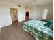 Bedroom showcasing an en-suite bathroom with walk-in closet at 6315 Shoreline Dr # 3204, Seminole, FL 33708