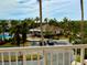 Beautiful community view with lush tropical landscaping, community building, parking and a sparkling community pool at 6315 Shoreline Dr # 3204, Seminole, FL 33708