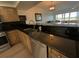 Kitchen featuring granite countertops, stainless steel appliances, wood cabinets, and modern fixtures at 6315 Shoreline Dr # 3204, Seminole, FL 33708