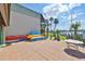 Exterior of a building with colorful kayaks ready for water adventures and boating access at 1028 Apollo Beach Blvd # 13, Apollo Beach, FL 33572