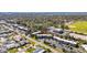 Aerial view of a multi-unit apartment building in a neighborhood near a park with sports fields and close to the water at 1370 70Th N St # 2-1382, St Petersburg, FL 33710