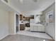Bright kitchen with white cabinets, tile flooring and modern appliances at 1370 70Th N St # 2-1382, St Petersburg, FL 33710