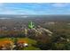 An aerial shot showing the community with view of lake in the distance on the horizon at 16109 Northglenn Dr, Tampa, FL 33618