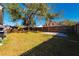 A spacious backyard with a well-maintained lawn and a wooden fence at 16109 Northglenn Dr, Tampa, FL 33618