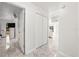 Hallway with a closet, marble flooring, and white walls at 16109 Northglenn Dr, Tampa, FL 33618