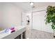 Bright room with a large closet, marble flooring and a white marble table at 16109 Northglenn Dr, Tampa, FL 33618