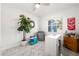 Bright room with a white accent wall, neutral decor, large window and marble flooring at 16109 Northglenn Dr, Tampa, FL 33618