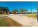 Neighborhood street view showcasing well-maintained homes and greenery on a sunny day at 16109 Northglenn Dr, Tampa, FL 33618